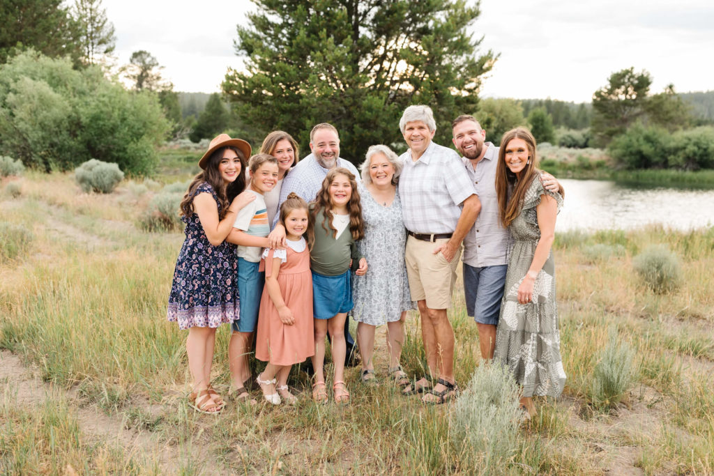 extended family standing next to the Deschutes river