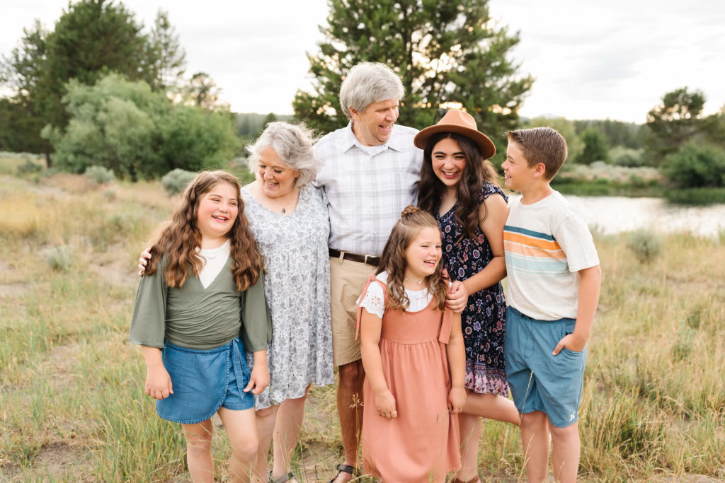 grandchildren with grandparents during extended family photoshoot