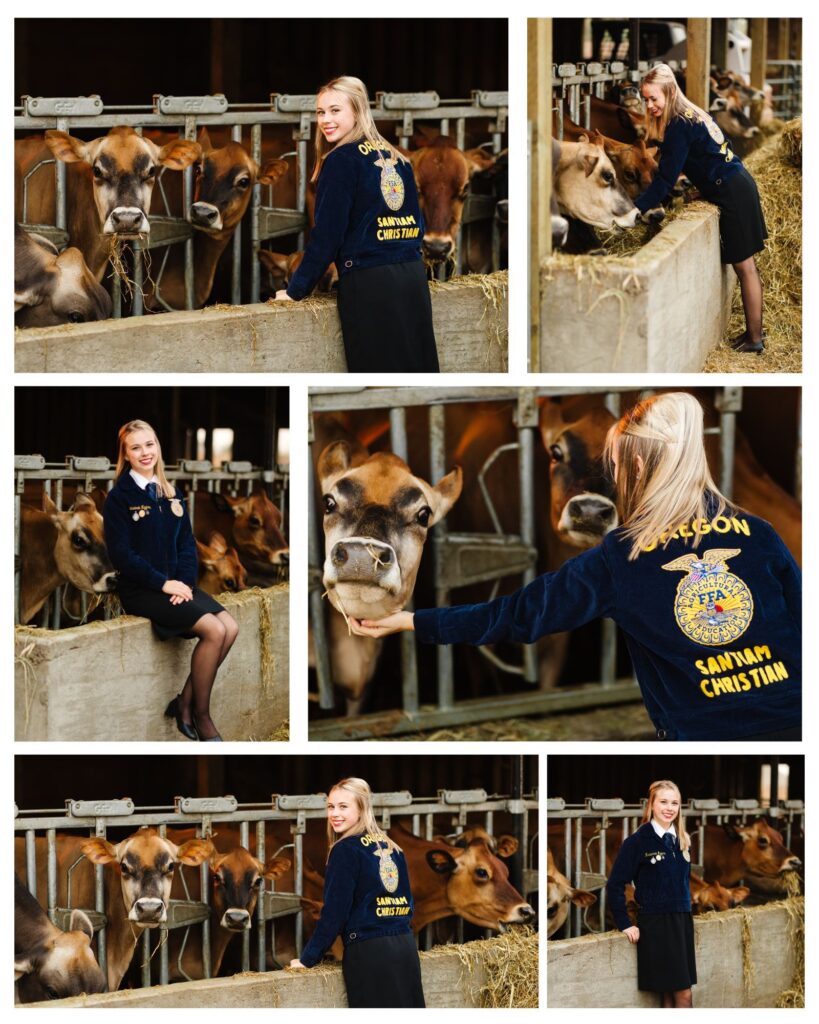 blonde high school senior standing with cows eating at dairy wearing FFA uniform during unique senior photo session idea