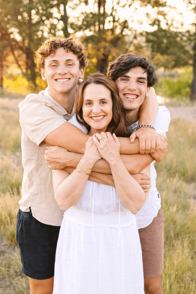 Mother and children embracing during a joyful extended family photography Bend reunion session.