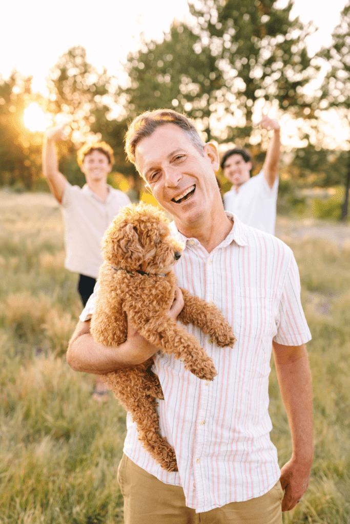 Parents and kids laughing together during a relaxed Central Oregon family photography session.