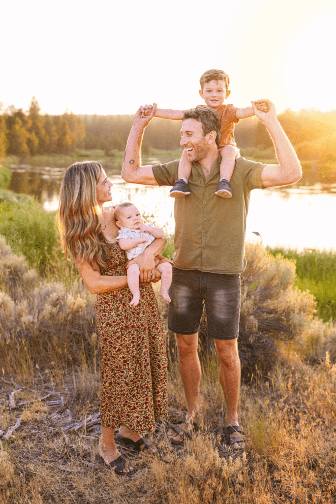 Parents and kids smiling together during a relaxed extended family photography Bend session in Central Oregon.