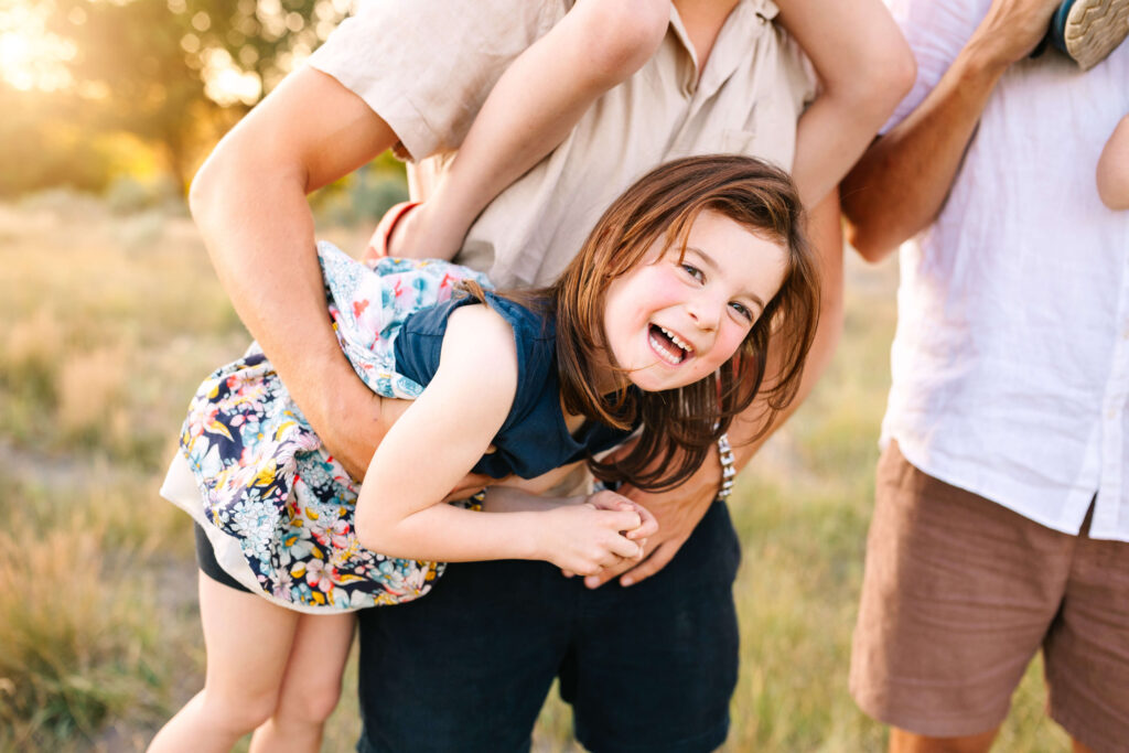 Sibling family unit photographed together during extended family photography Bend gathering.