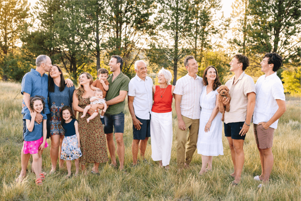 Large extended family portrait during a reunion vacation in Bend Oregon with grandparents, parents, and children.